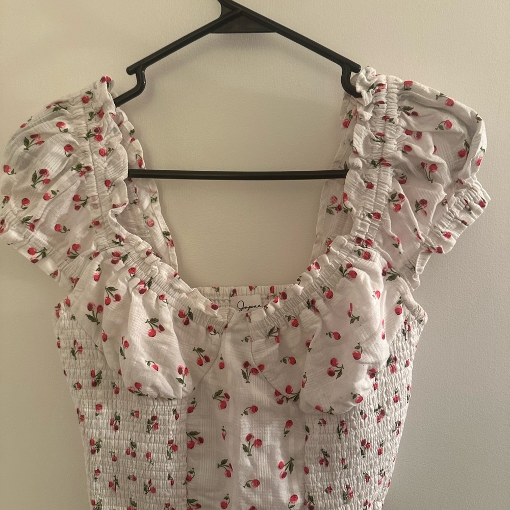 Japna White Top with Red Floral Accents